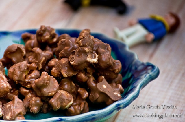 Pop corn ricoperti al cioccolato al latte