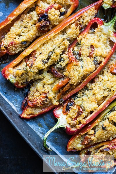 Peperoni ripieni di cous cous, pomodori confit e capperi semicanditi